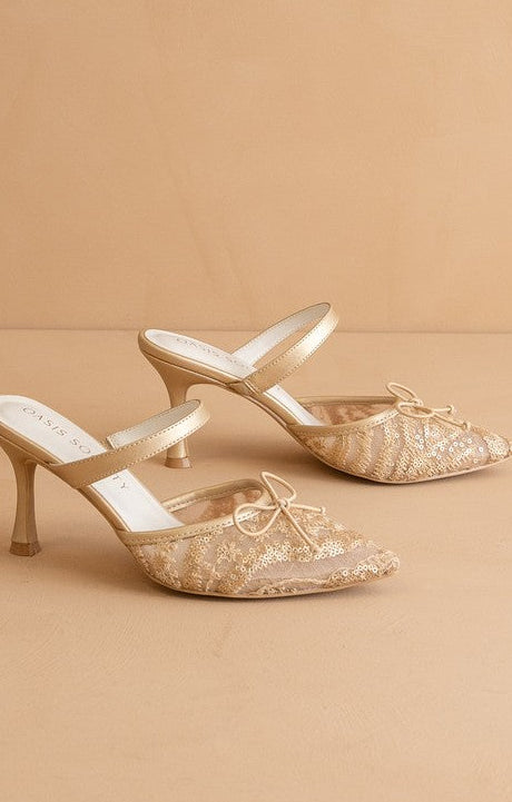 Step out in sweet Southern charm with golden mesh heels, sequin and lace touches, bows, and a dainty strap. Elle Boutique, Zachary, LA.