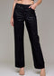 High-rise black denim Kalani Jeans with wide legs, cuffed hems, and beige peep-toe heels. Elle Boutique, Zachary, LA.