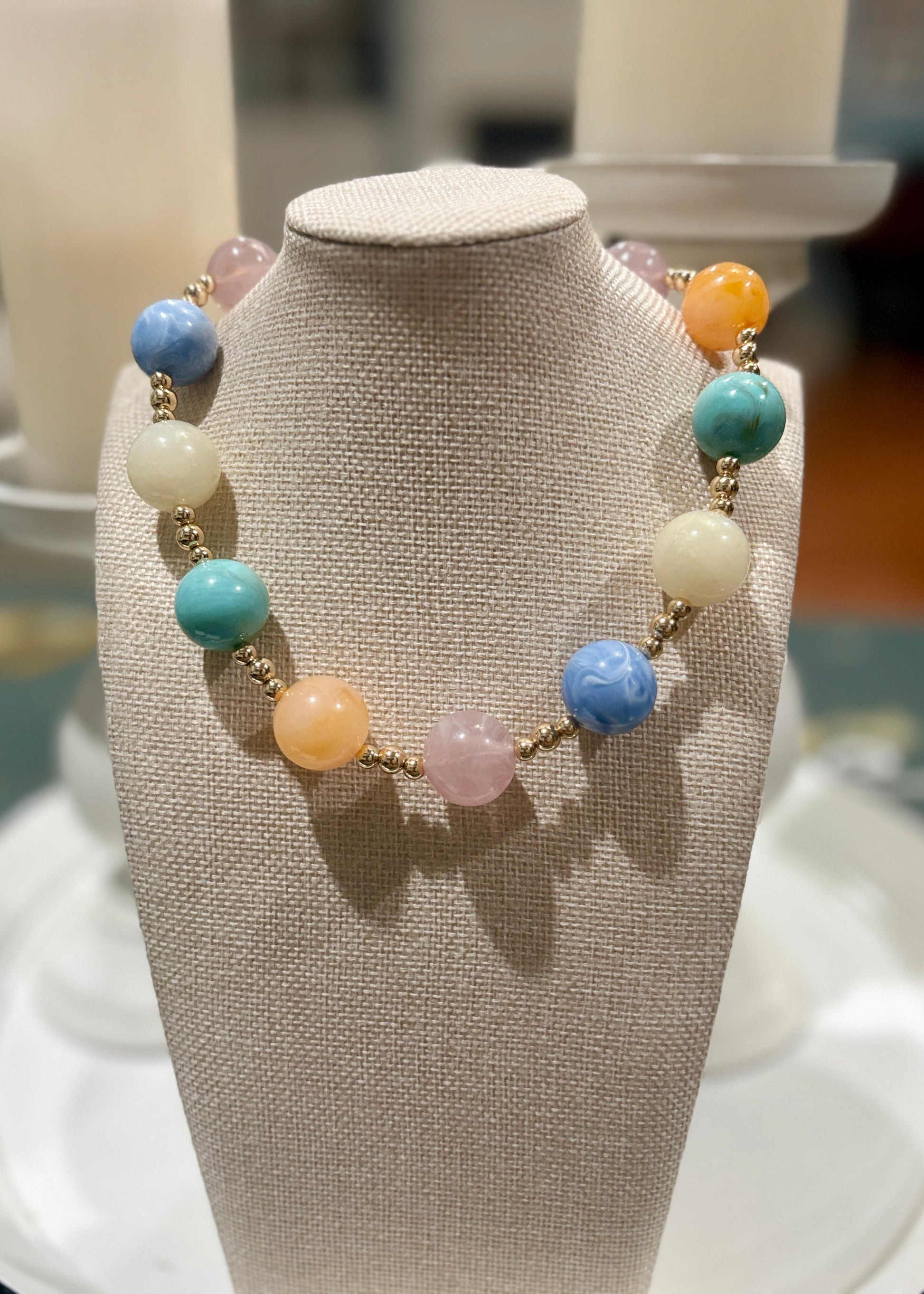 Sweeten up your day with pastel beads in blue, white, pink, orange & turquoise. Elle Boutique, Zachary, LA.