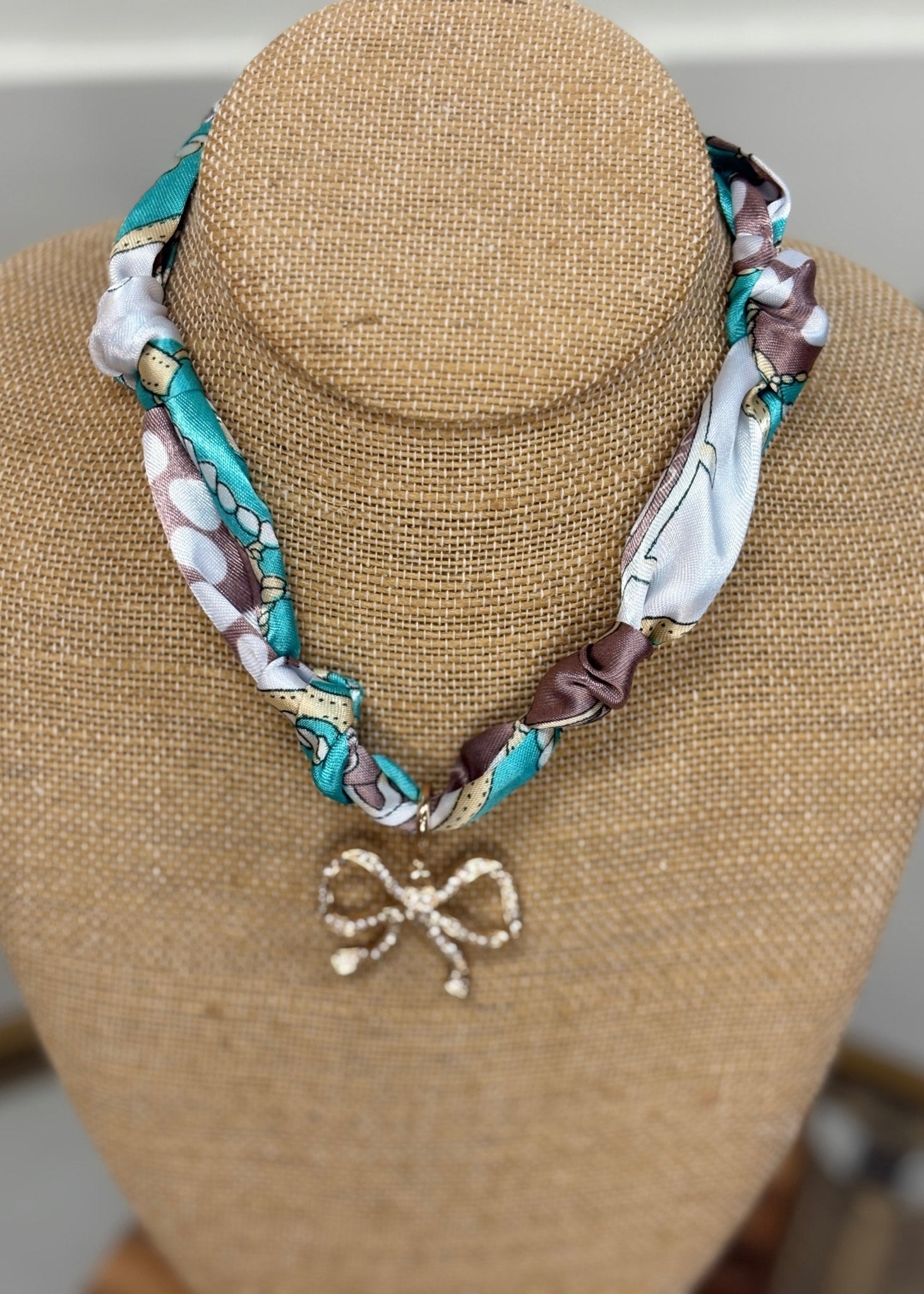 Crystal Bow Statement Necklace - ElleBoutiqueZachary