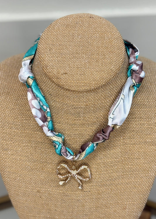 Crystal Bow Statement Necklace - ElleBoutiqueZachary