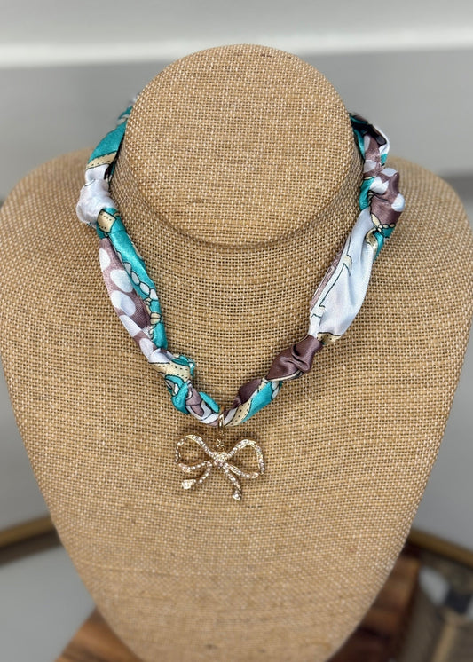 Crystal Bow Statement Necklace - ElleBoutiqueZachary